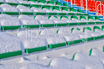 Background chairs at stadium , winter