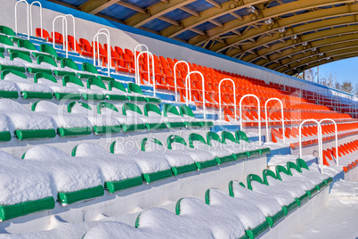 Background chairs at stadium , winter