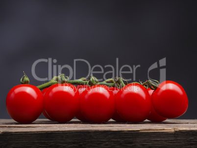 Cherry tomatoes on a wooden table