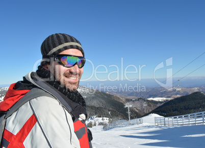 Handsome young man in the ski resort