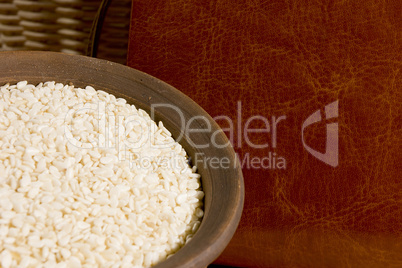 Sesame seeds in a clay plate
