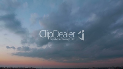 Evening Clouds over the City. Time Lapse