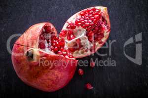 Pomegranate on a stone plate