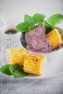 Beef and grilled corn