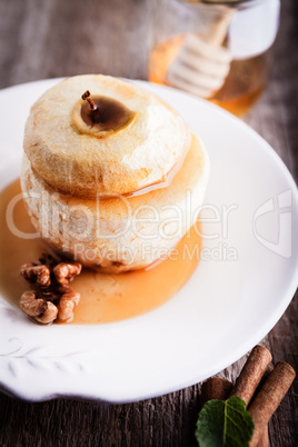 Baked apple with nuts and raisins