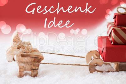 Reindeer With Sled, Red Background, Geschenk Idee Means Gift Idea