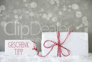 Cement Background With Bokeh, Geschenk Tipp Means Gift Tip
