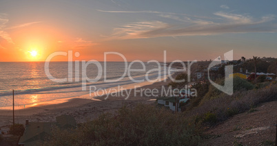 Sunset over Cottages along Crystal Cove Beach