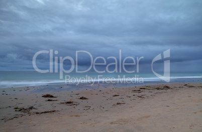 Rain clouds approach Crystal Cove Beach