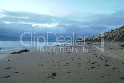 Rain clouds approach Crystal Cove Beach from the ocean