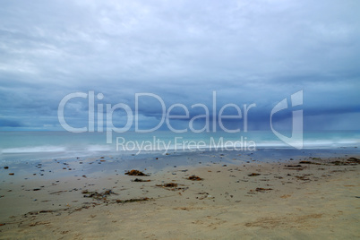 Rain clouds approach Crystal Cove Beach