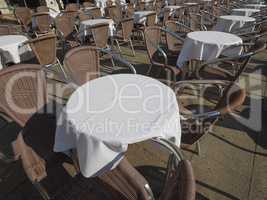 Many tables and chairs