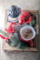 Christmas cocoa in mug on the wooden tray