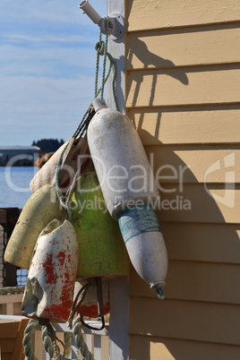 Fishnet Wooden and Styrofoam Floats hang to dry