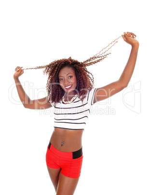 Beautiful black woman pulling her hair.