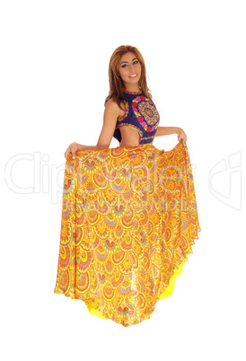 Gorgeous woman in long yellow skirt.