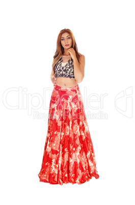 Beautiful woman in long red skirt