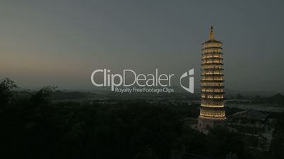 Bai Dinh Temple with illuminated tower at night, Vietnam