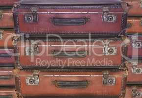 Evacuation - Old worn travel suitcases