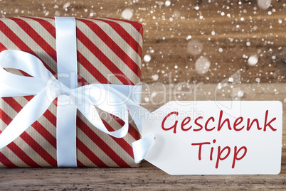 Present With Snowflakes, Text Geschenk Tipp Means Gift Tip