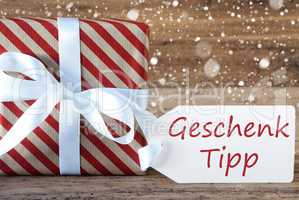 Present With Snowflakes, Text Geschenk Tipp Means Gift Tip
