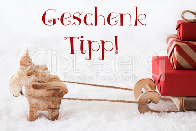 Reindeer With Sled On Snow, Geschenk Tipp Means Gift Tip