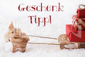 Reindeer With Sled On Snow, Geschenk Tipp Means Gift Tip