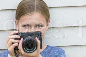 Girl Child Taking Picture With A Camera