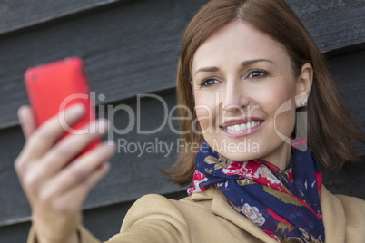 Middle Aged Woman Taking Cell Phone Selfie