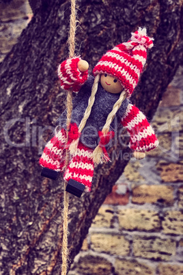 Rag doll hanging on a rope