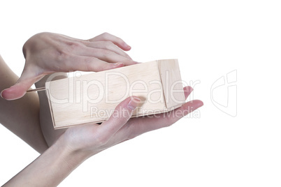 Hands opening box