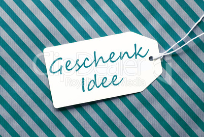 Label On Turquoise Wrapping Paper, Geschenk Idee Means Gift Idea