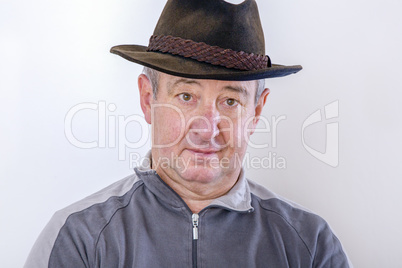 Man with hat as head cover