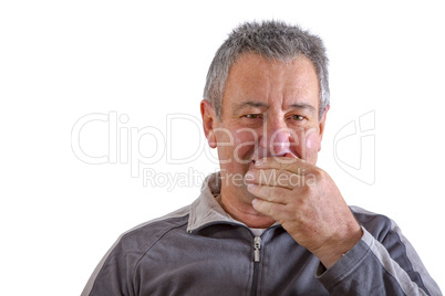 Man with hand in front of mouth