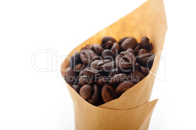 espresso coffee beans on a paper cone