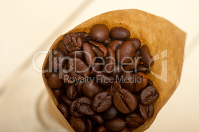 espresso coffee beans on a paper cone