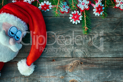 Santa claus sad face and fir branches decorated