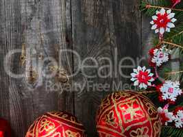 Christmas background with decorated branches of spruce and red g