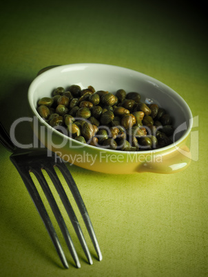 Capers in a rustic bowl