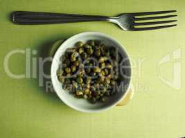 Capers in a bowl wih a fork