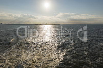 Wake behind the ferry from Harlingen to Vlieland in the Netherla