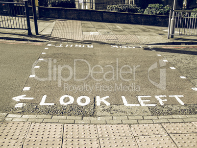 Vintage looking Look right look left sign on London zebra crossi