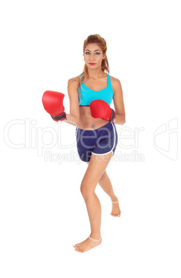 Woman with red boxing cloves.