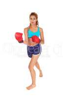 Woman with red boxing cloves.
