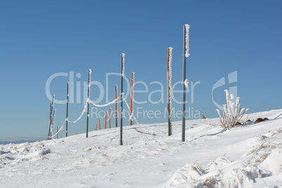 Frozen pilars with rope