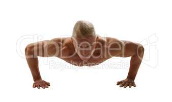 Naked bodybuilder posing while doing push-ups