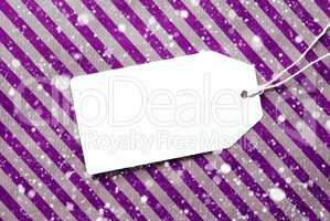 Label On Purple Wrapping Paper And Copy Space, Snowflakes