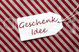 Label On Red Wrapping Paper, Geschenk Idee Means Gift Idea