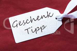 One Label On Red Background, Geschenk Tipp Means Gift Tip