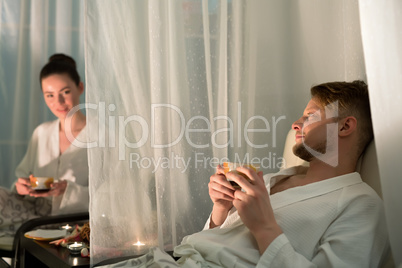 Young couple relaxing in wellness center